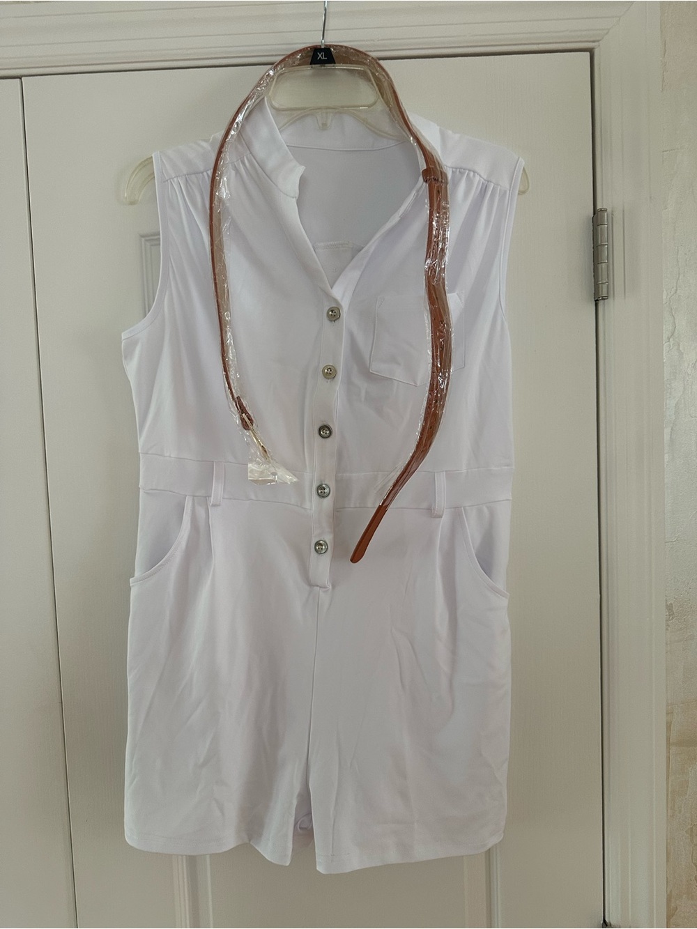 Sleeveless White Button-Front Romper with Belt